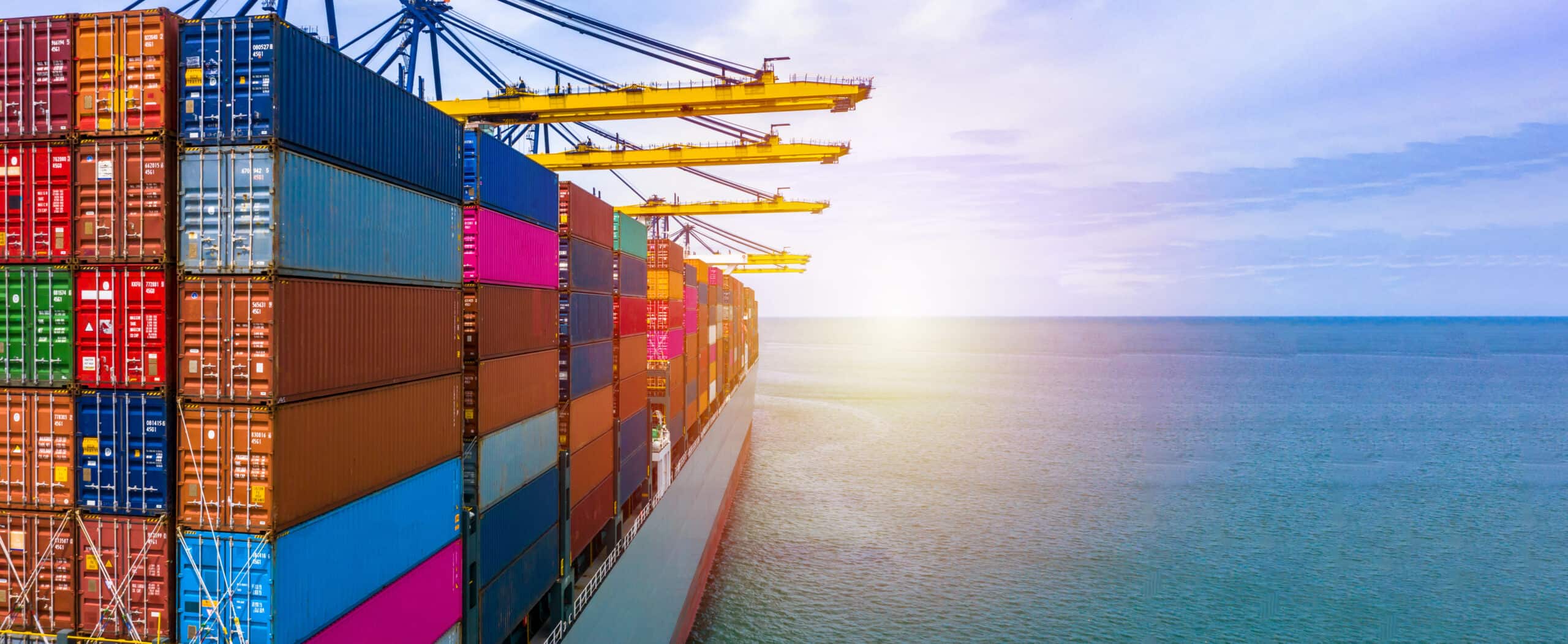 Container ship carrying container box in import export with quay Container ship carrying container box in import export with quay crane, Global business cargo freight shipping commercial trade logistic and transportation oversea worldwide by container vessel.